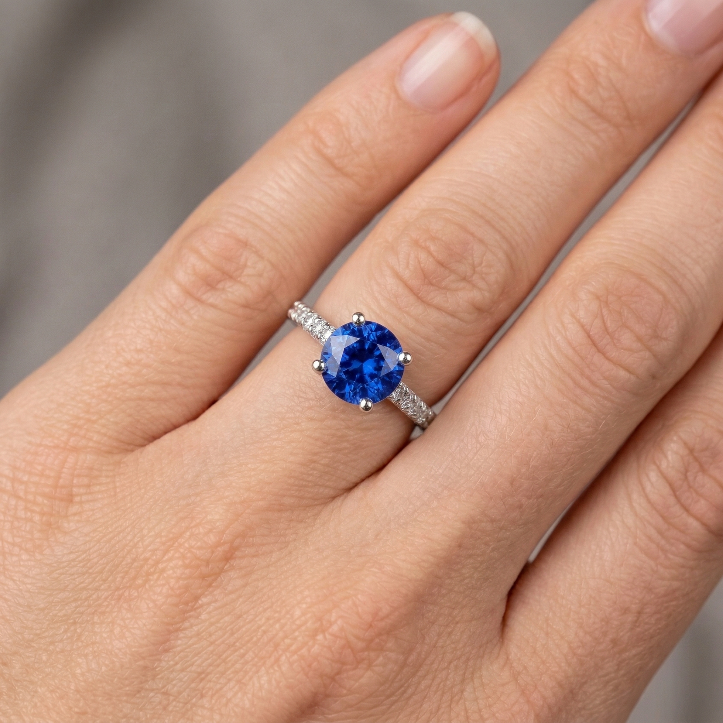 natural round sapphire 2.70ct ring on white background