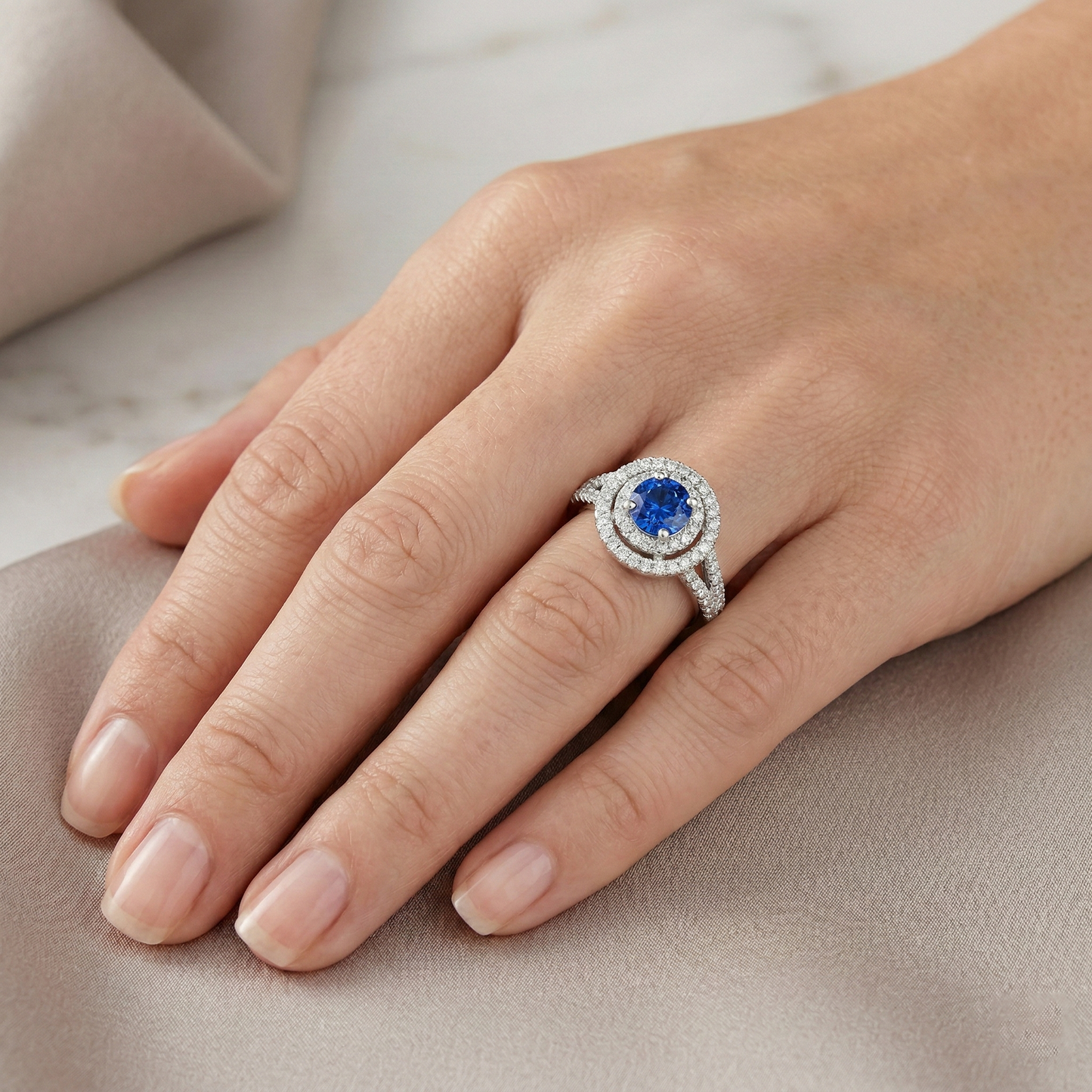 natural round sapphire 4.25ct ring on white background