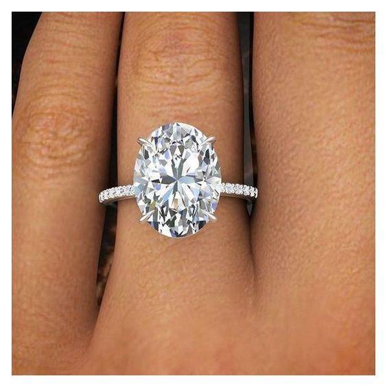 5 Carat Oval Natural Diamond Ring With Accents