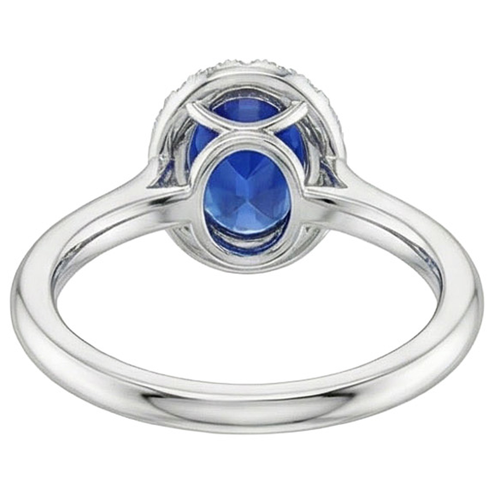 natural round sapphire 3ct ring on white background