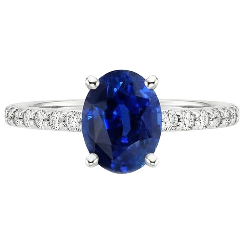 natural round sapphire 5.25ct ring on white background