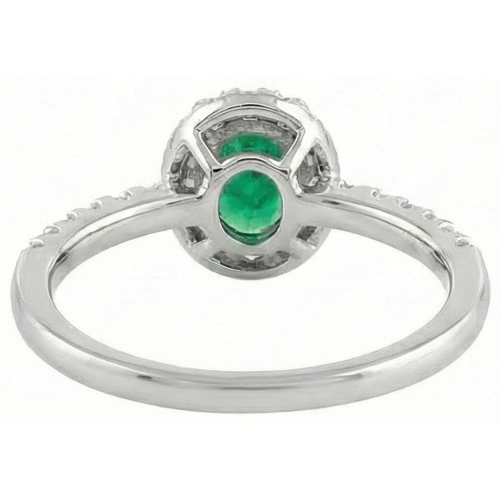 natural round emerald 3.85ct ring on white background