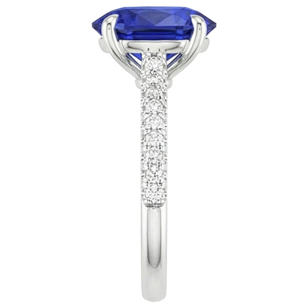 natural round sapphire 5.25ct ring on white background
