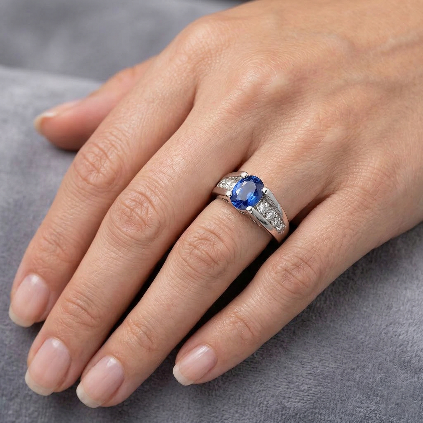 natural round sapphire 2.10ct ring on white background