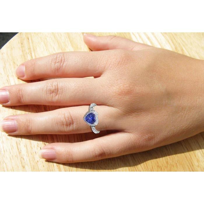 natural round tanzanite 2.10ct ring with diamond accents