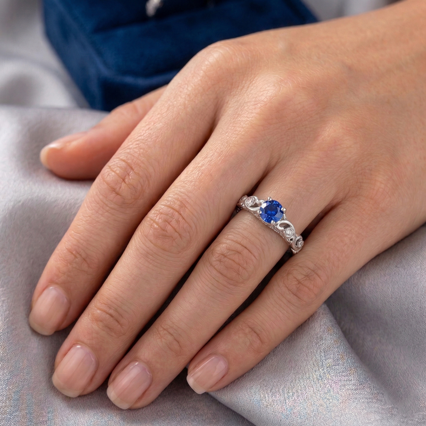 natural round sapphire 1.60ct ring on white background
