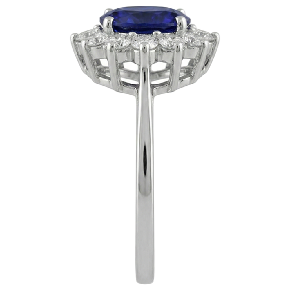 natural round tanzanite 11.75ct ring on white background