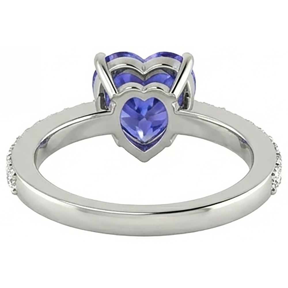 natural round tanzanite 2ct ring on white background