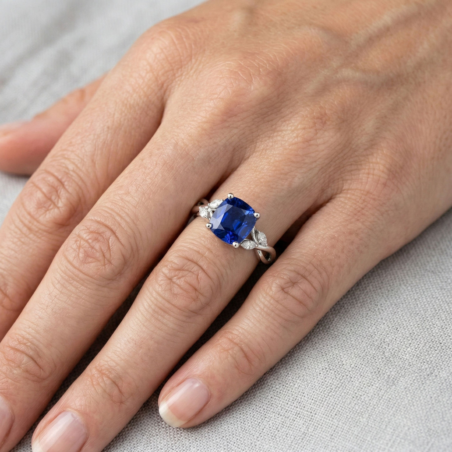 natural cushion sapphire 2.10ct ring on white background