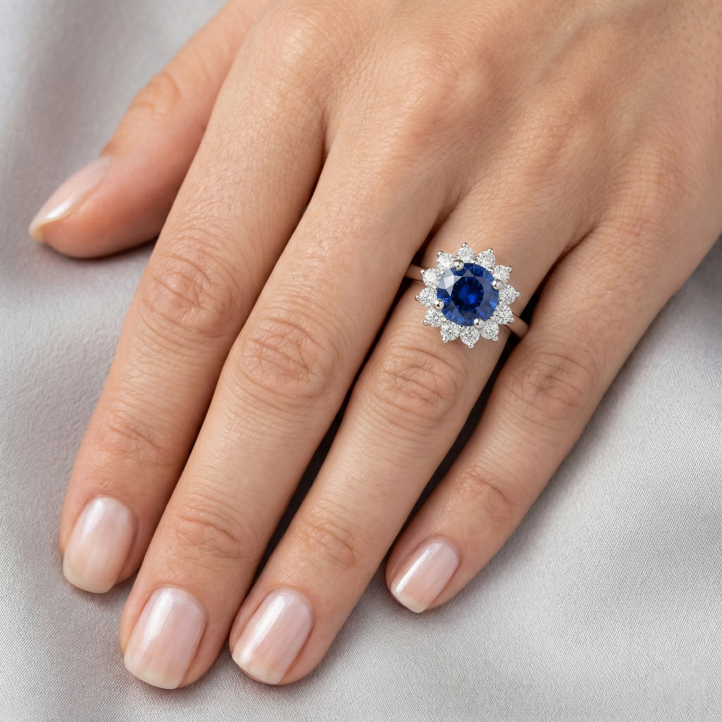 natural round sapphire 2.20ct ring on white background