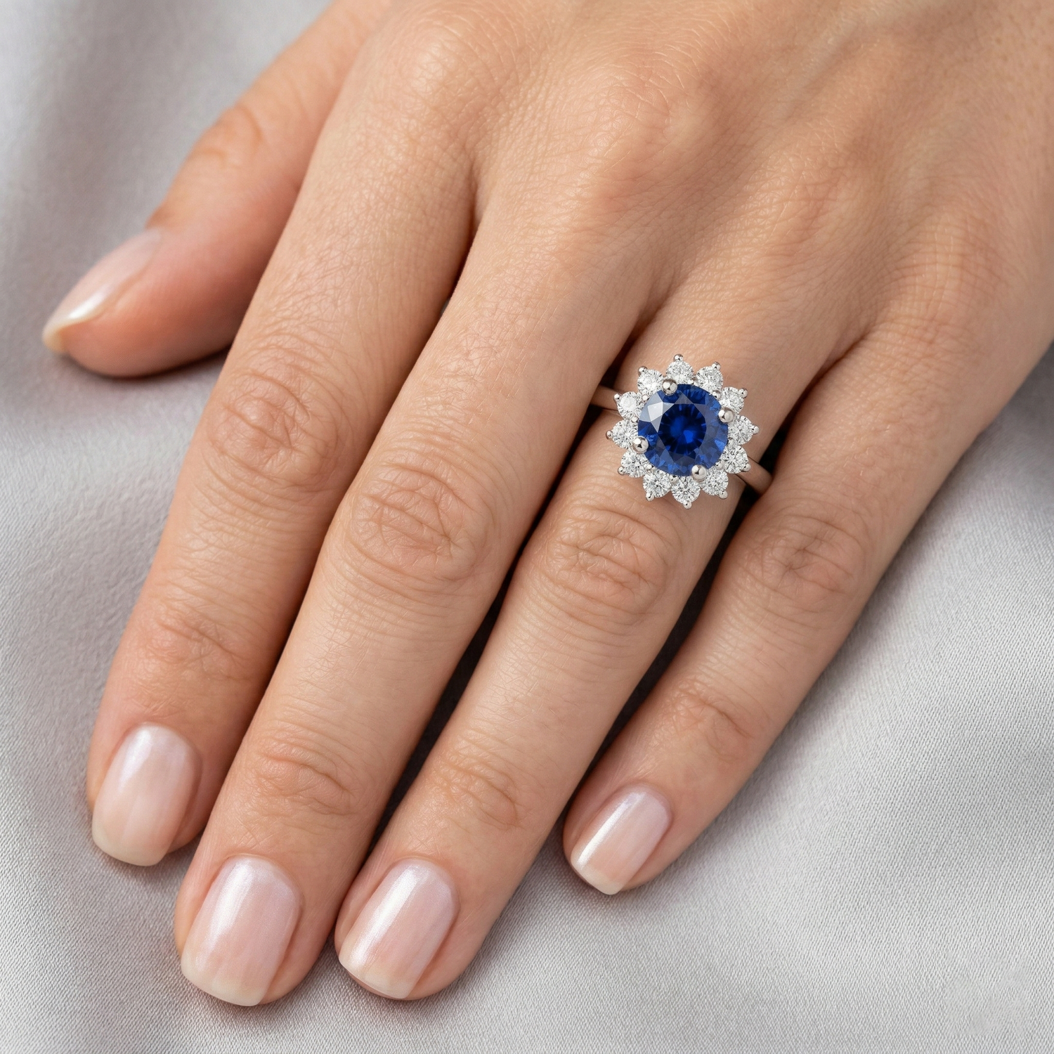 natural round sapphire 2.20ct ring on white background