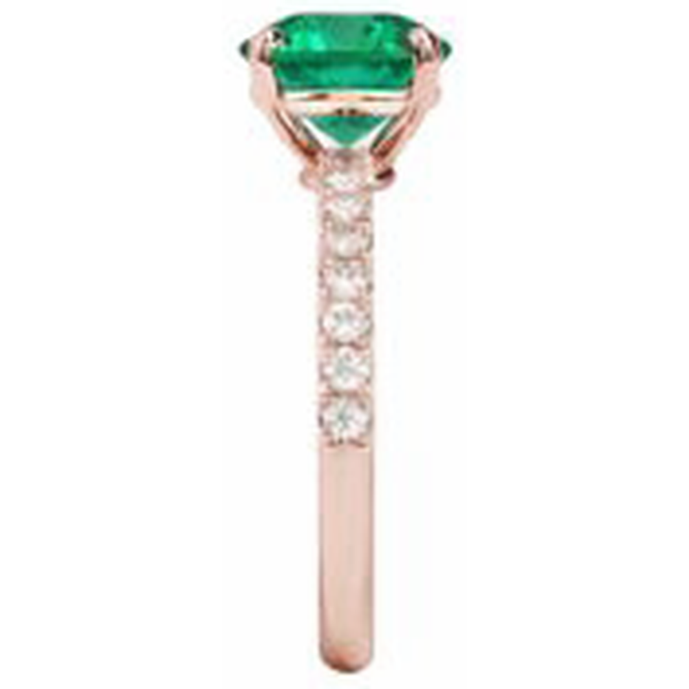 natural round emerald 3.25ct ring on white background
