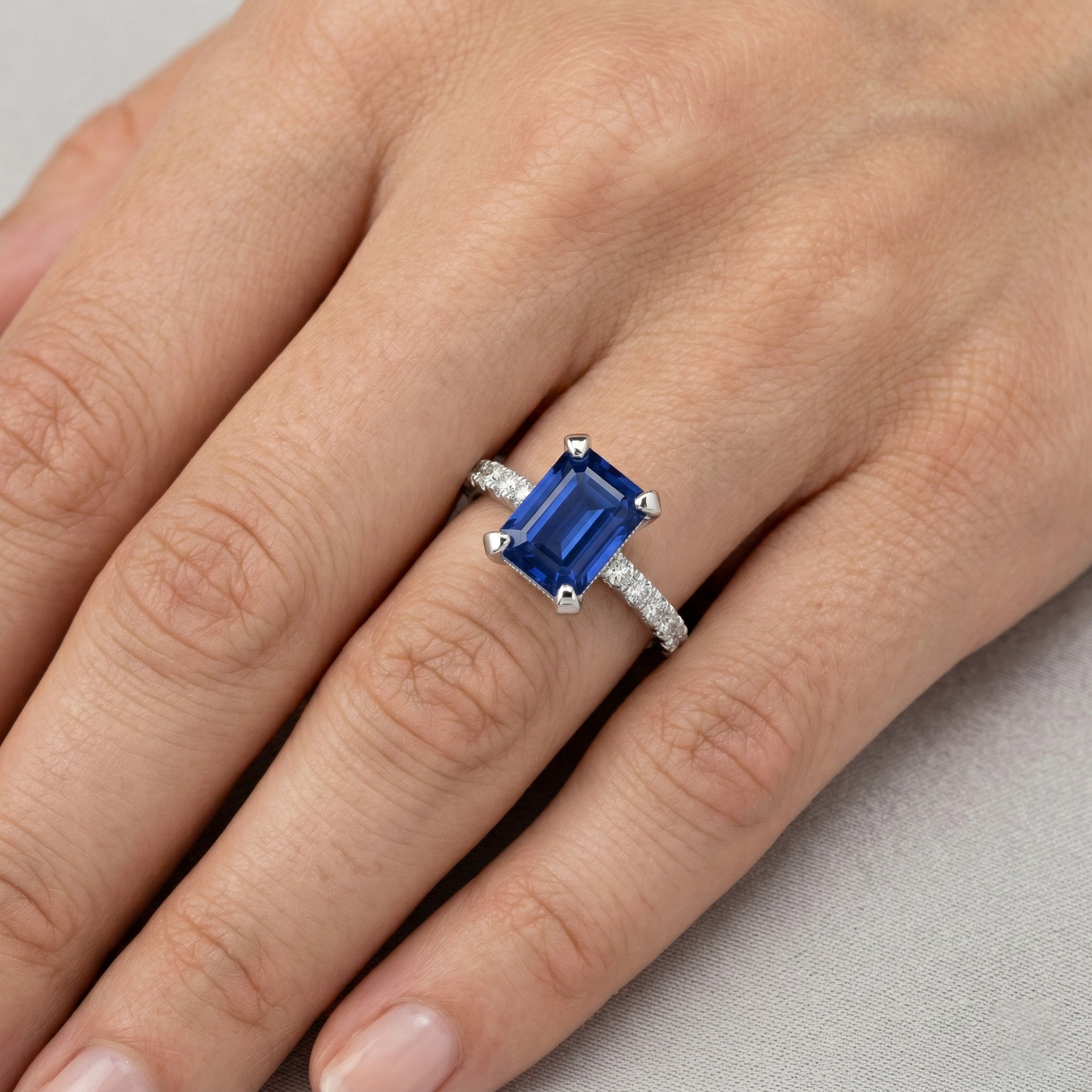 natural round sapphire 3ct ring on white background