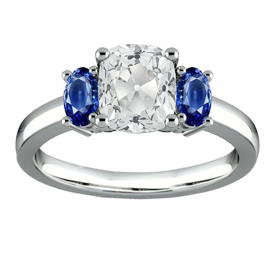 3 Stone Cushion Cut Diamond Ring With Sapphire Side Stones