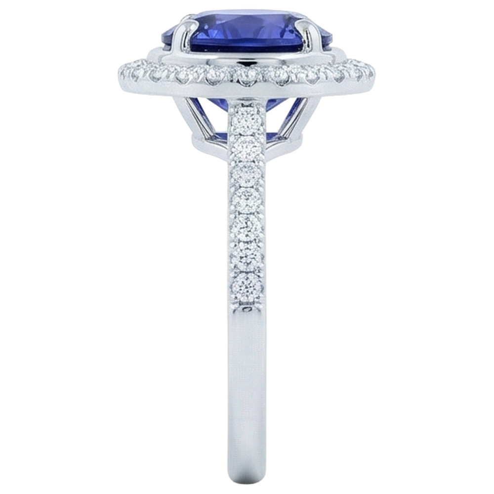 natural round tanzanite 4.25ct ring on white background