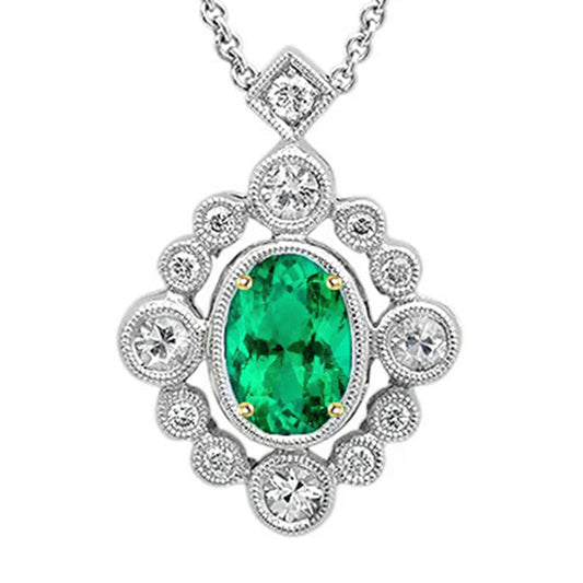 Fine Emerald Oval Cut Stone Pendant Necklace in 14 Karat Two Tone Gold – main view