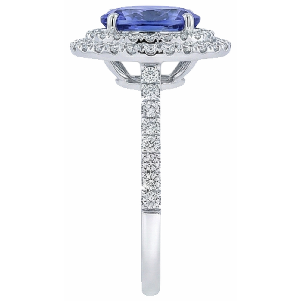 natural round tanzanite 4ct ring on white background
