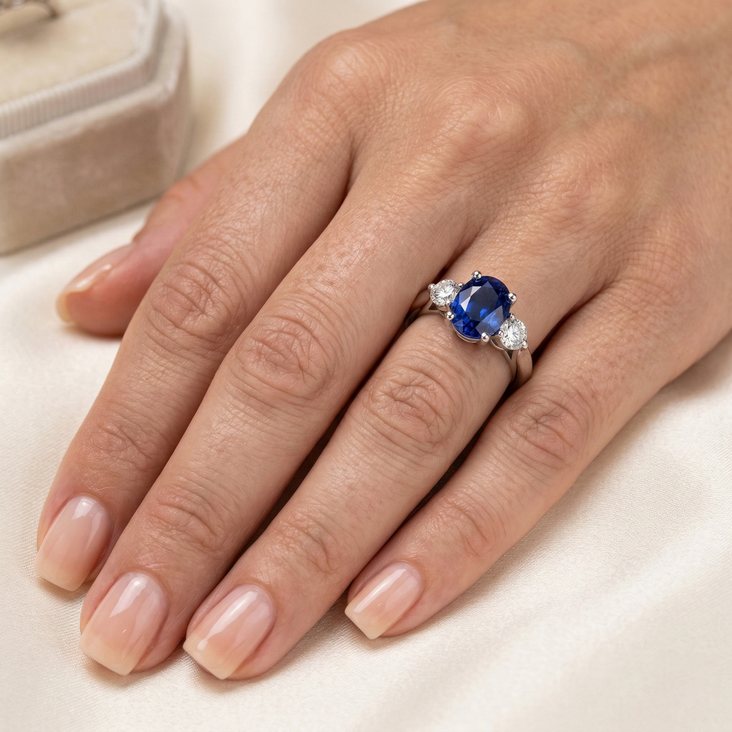 natural round sapphire 3ct ring on white background