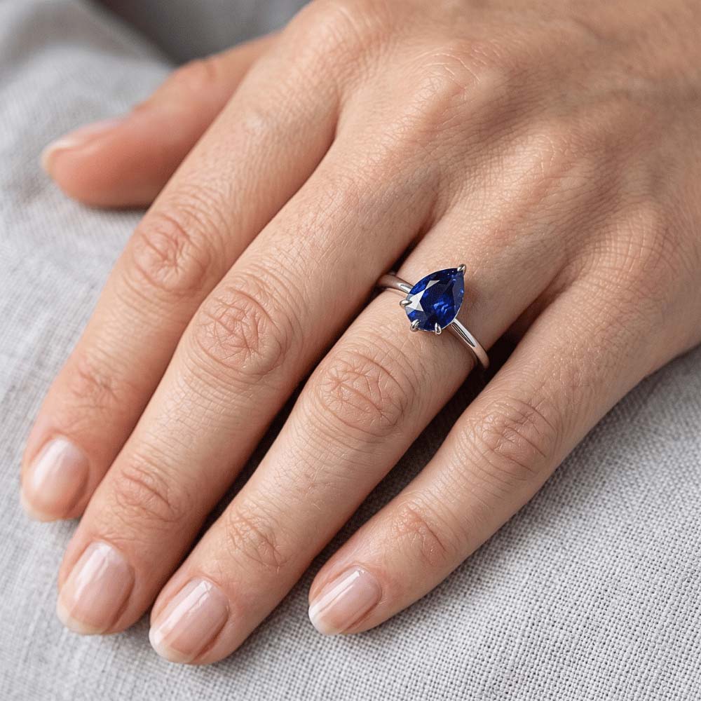 Eagle Claw Prongs Ladies Solitaire Ring Pear Cut Blue Sapphire Jewelry