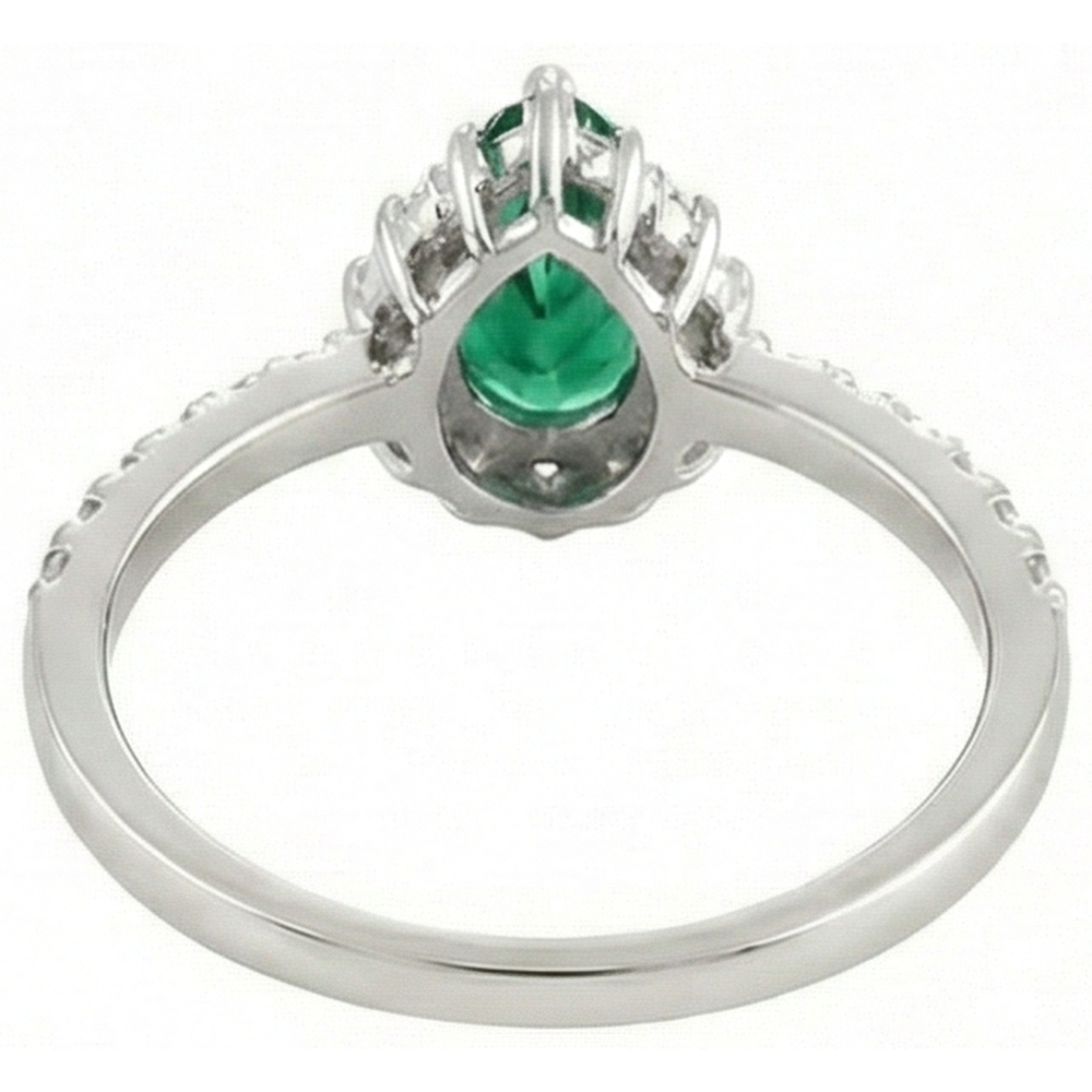 natural round emerald 4.80ct ring on white background