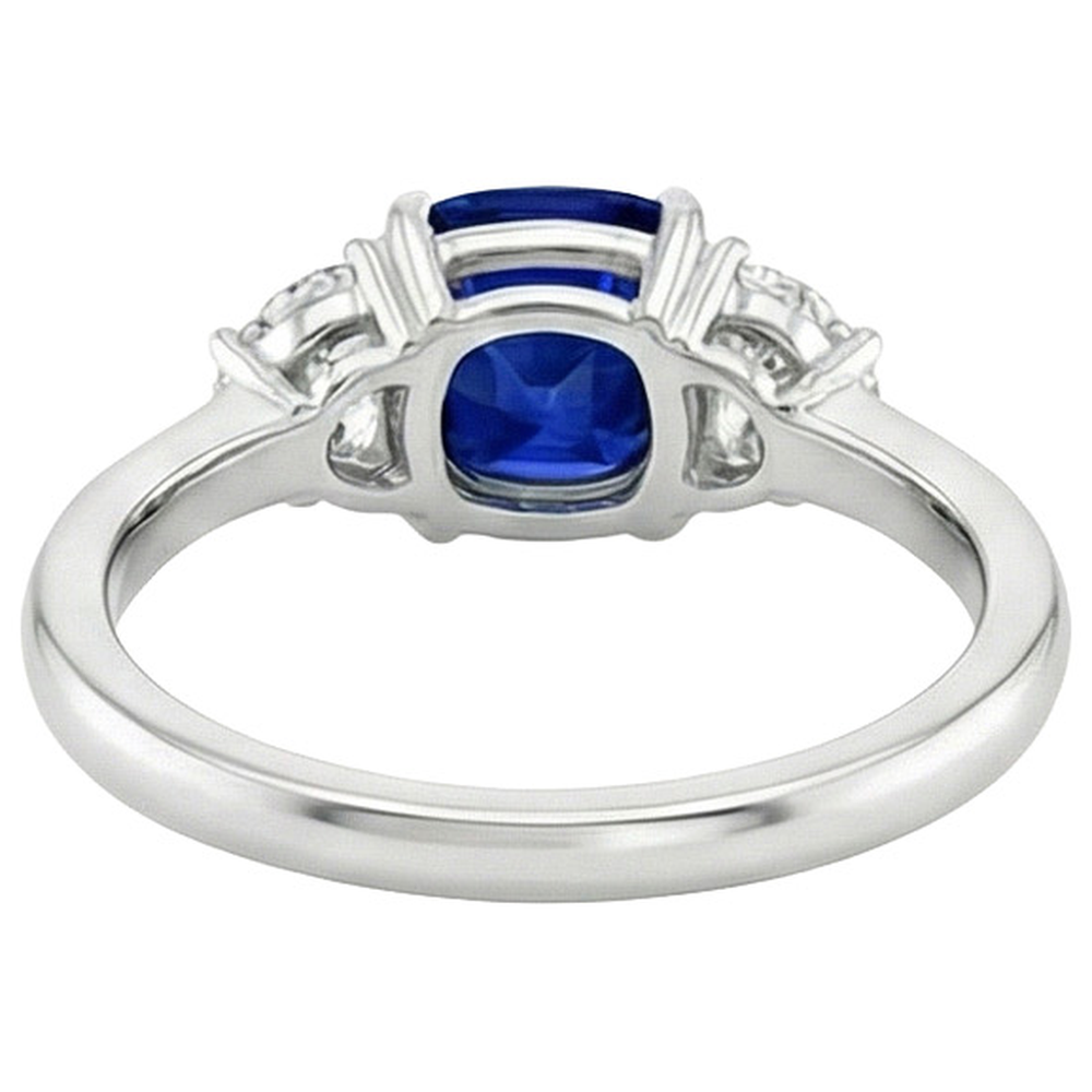 natural cushion sapphire 3ct ring on white background