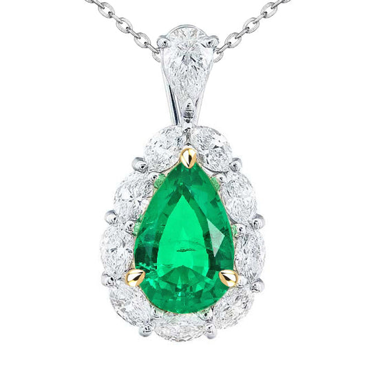 Pear Cut Colombian Emerald ring in 14 Karat Two Tone Gold – main view