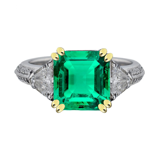 Fine Emerald Step Cut Precious Stone Ring in 14 Karat Two Tone Gold – main view