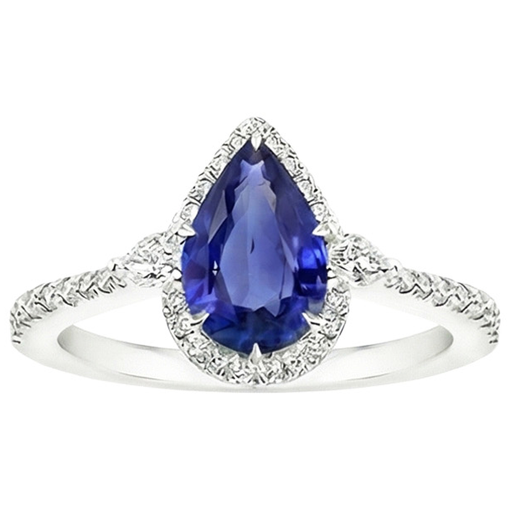 natural round sapphire 5.25ct ring on white background