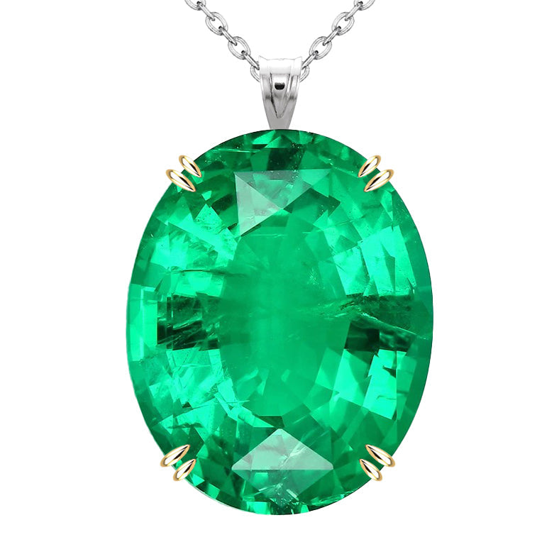 Oval Fine Emerald ring in 14 Karat Two Tone Gold – main view