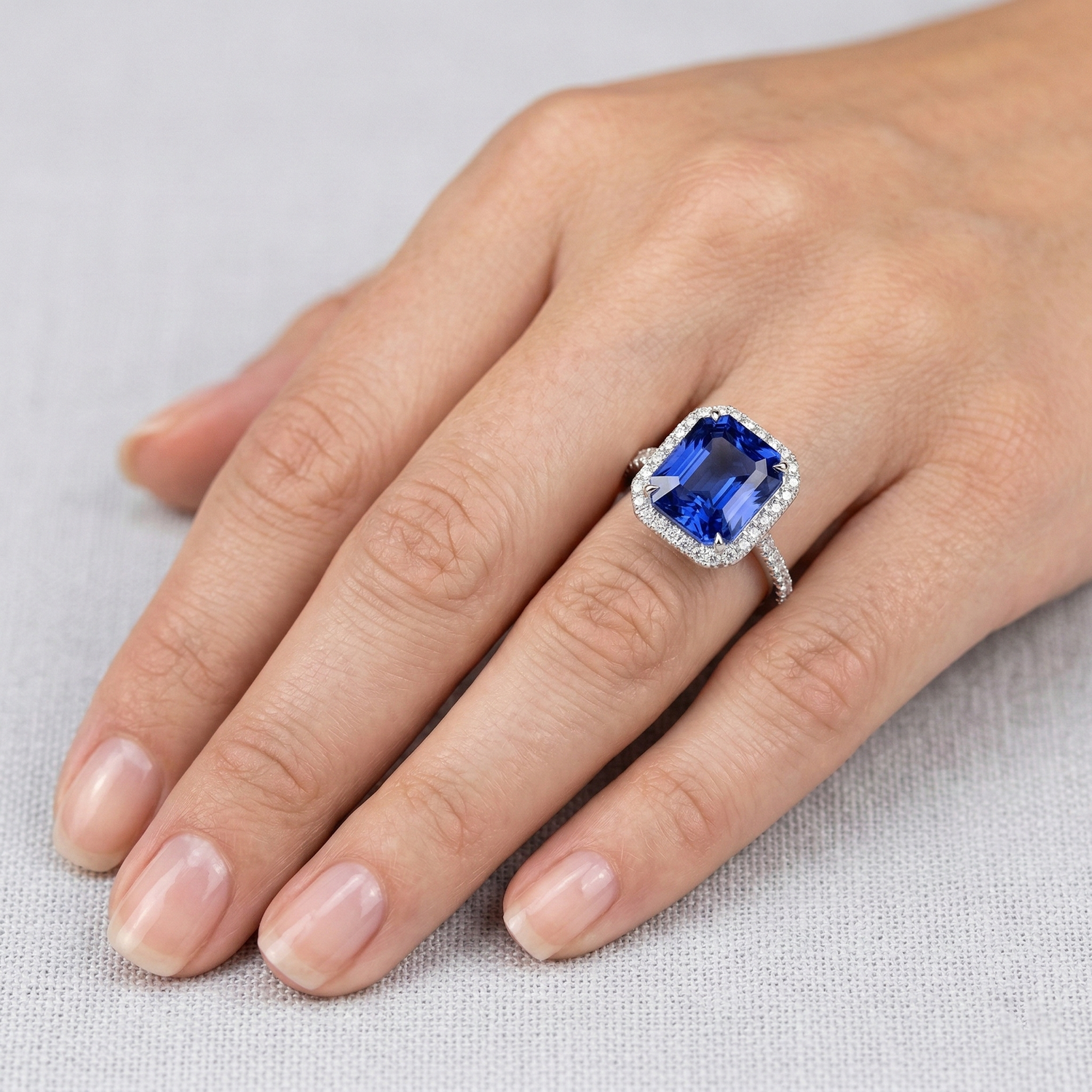 natural round sapphire 5ct ring on white background