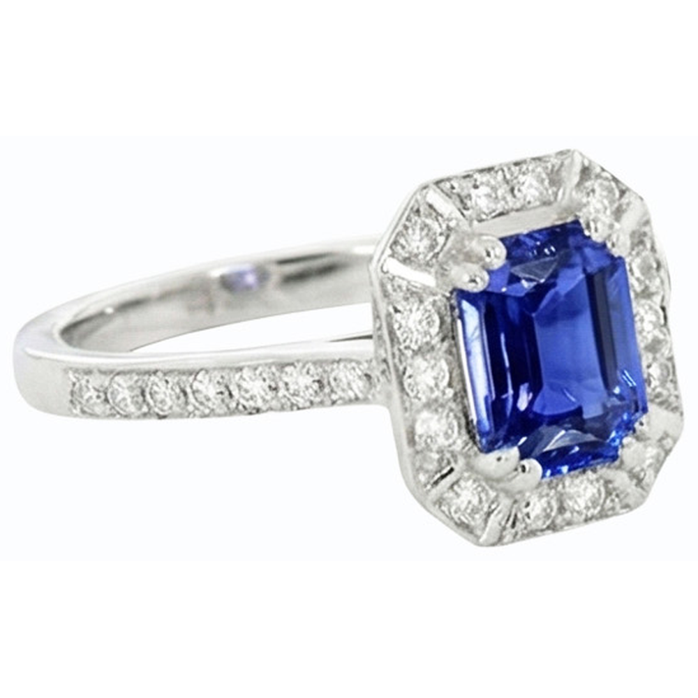 natural emerald sapphire 3ct ring on white background