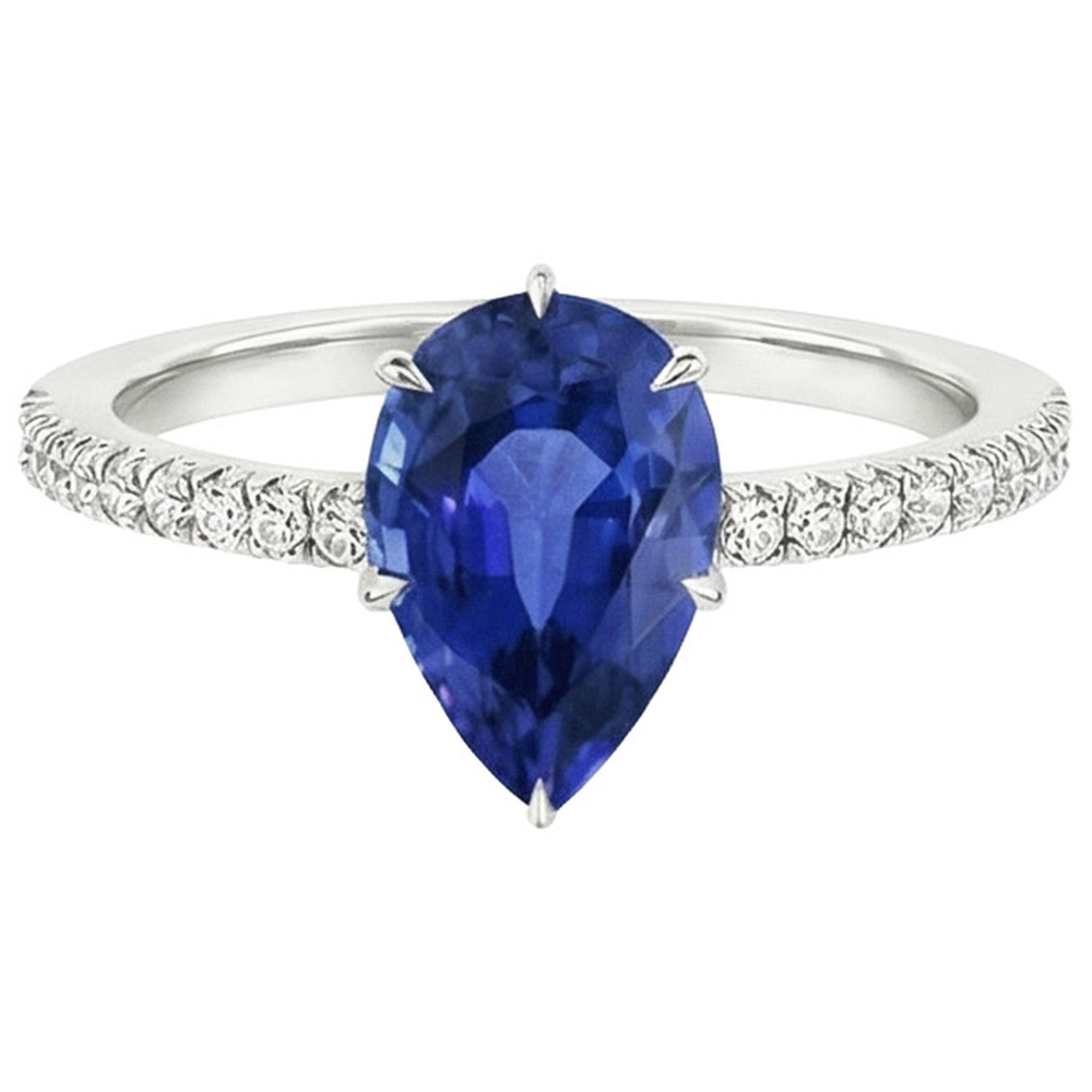 natural round sapphire 5.25ct ring on white background