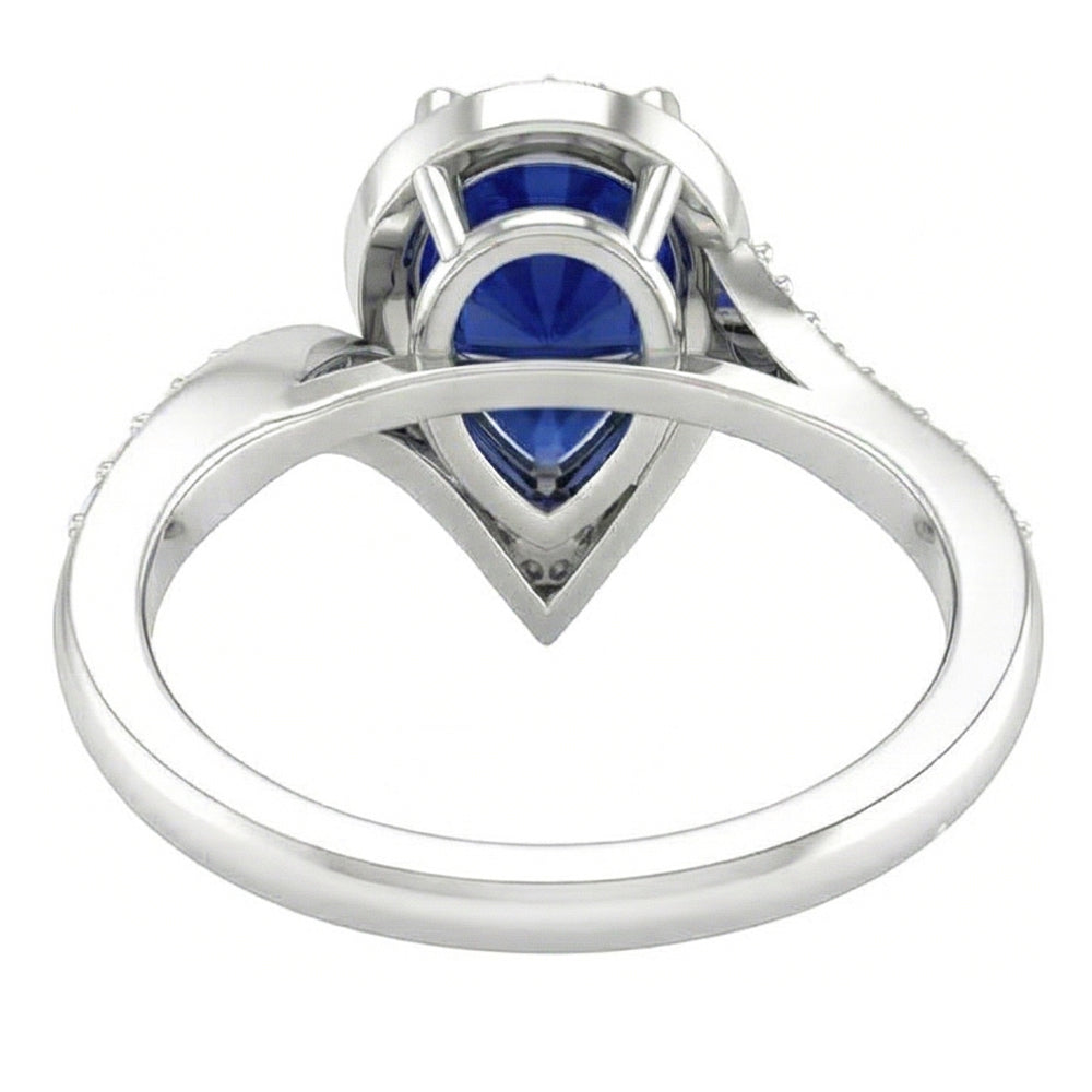 Pear Cut Royal Blue Sapphire ring in 14K White Gold – profile view