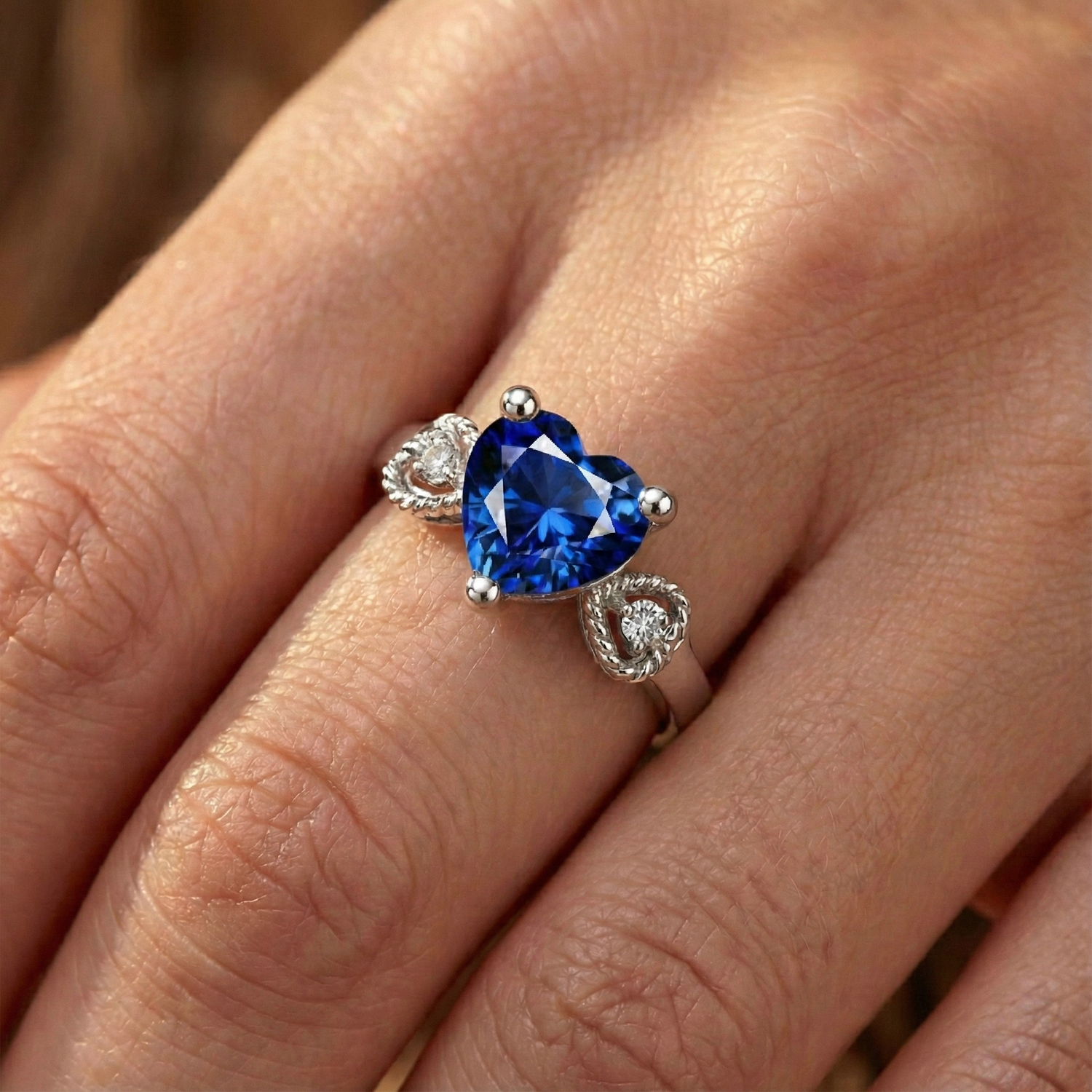 natural round sapphire 2.25ct ring on white background