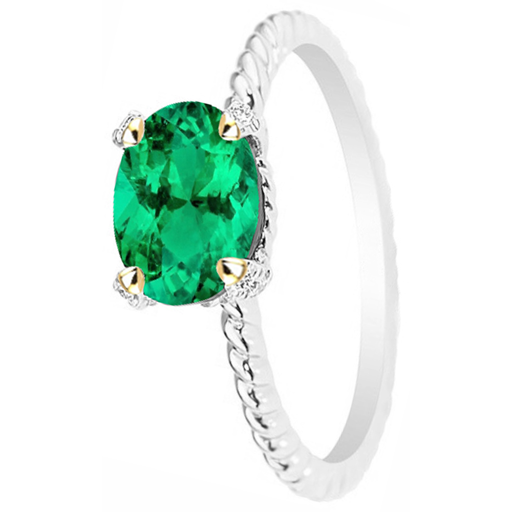 Oval Cut Colombian Emerald ring in 14 Karat Two Tone Gold – top view