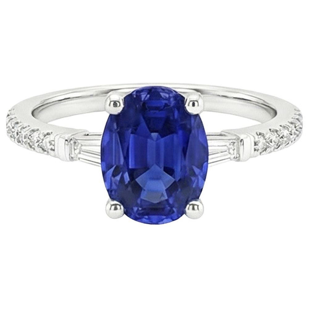 natural round sapphire 3ct ring on white background