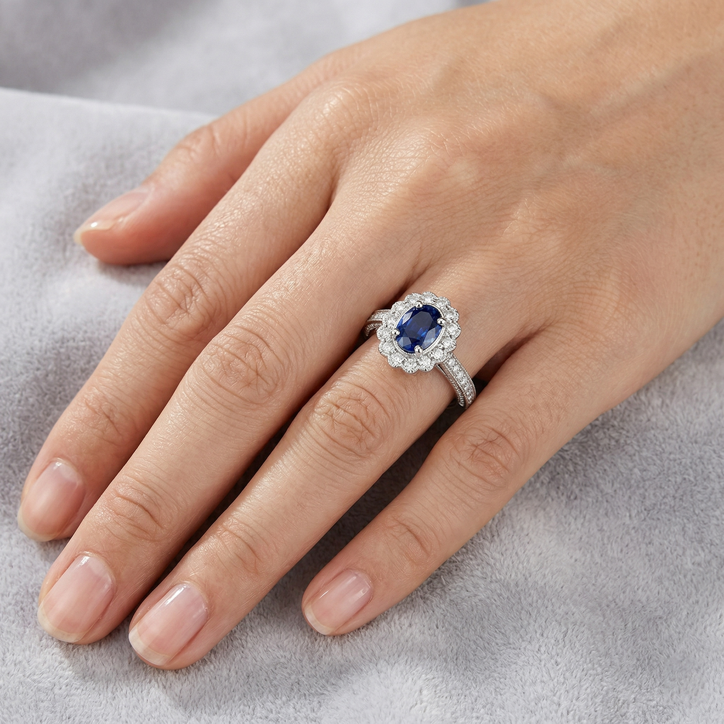natural round sapphire 2ct ring on white background