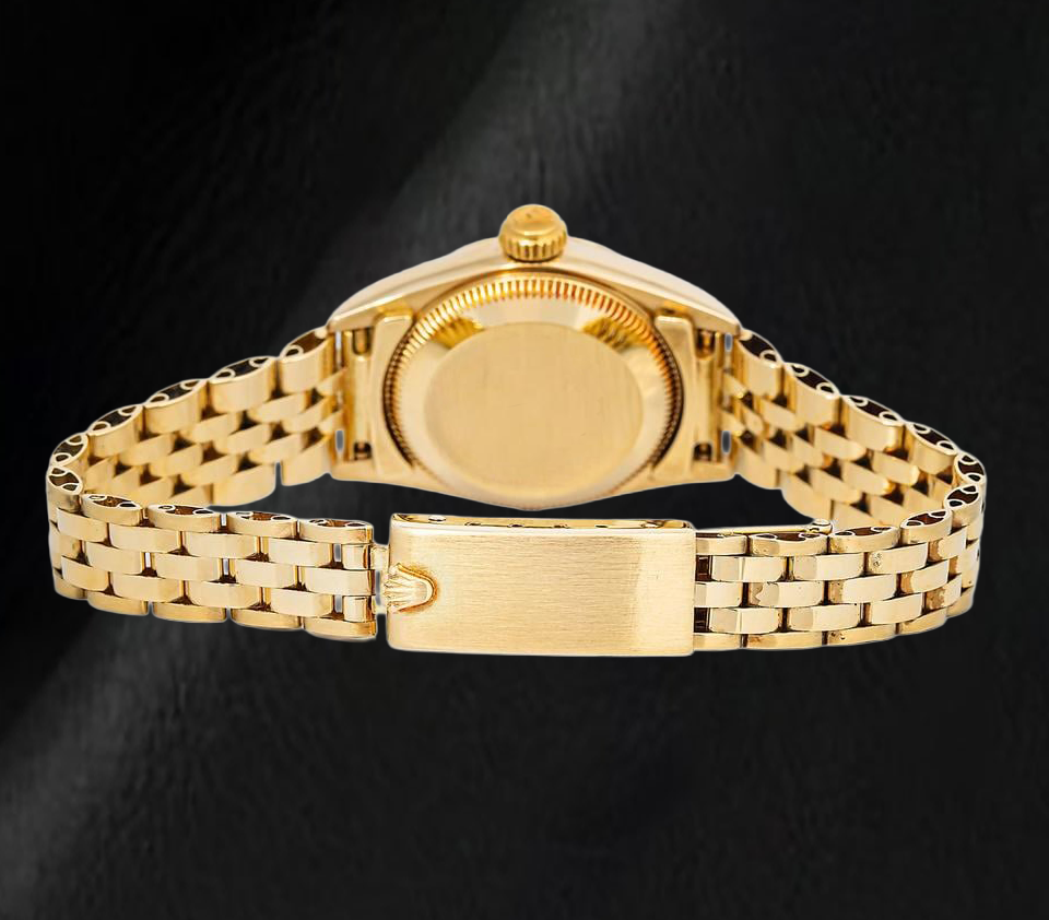 Rolex 67197 Oyster Prepetual Black Stick Dial 24mm Yellow Gold Ladies Watch