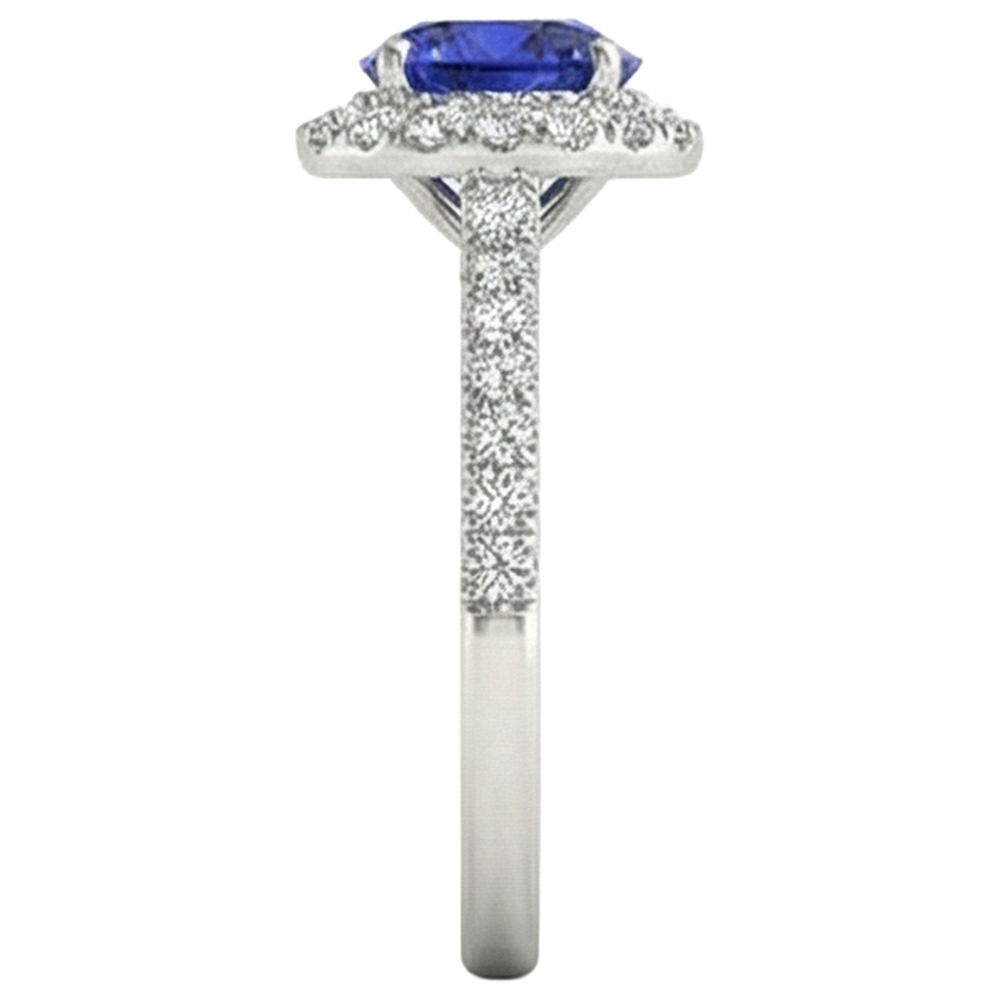 natural round tanzanite 6.75ct ring on white background