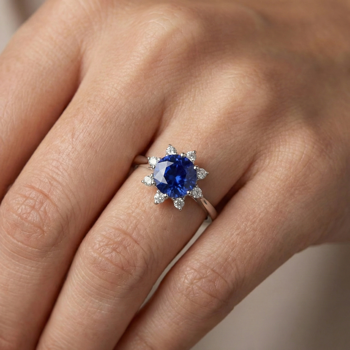 natural round sapphire 3ct ring on white background