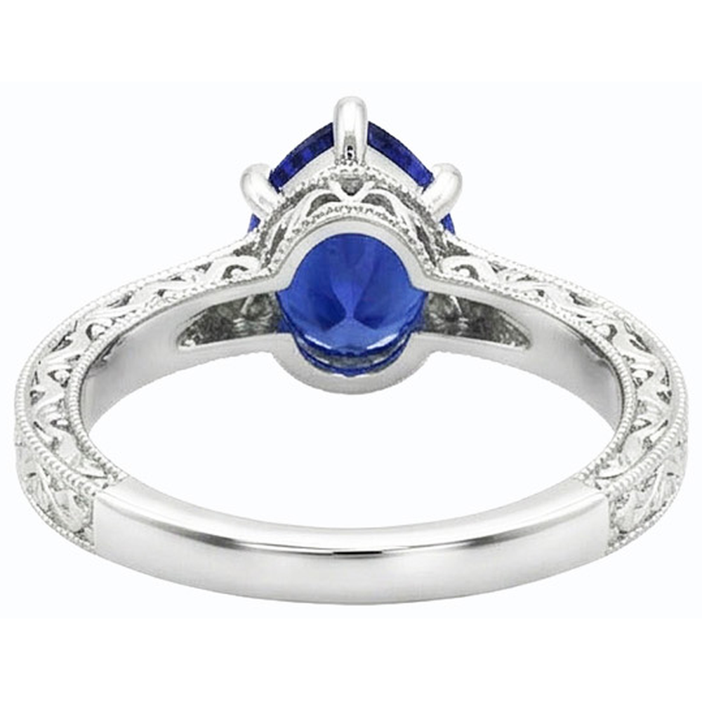 natural pear sapphire 2ct ring close up detail