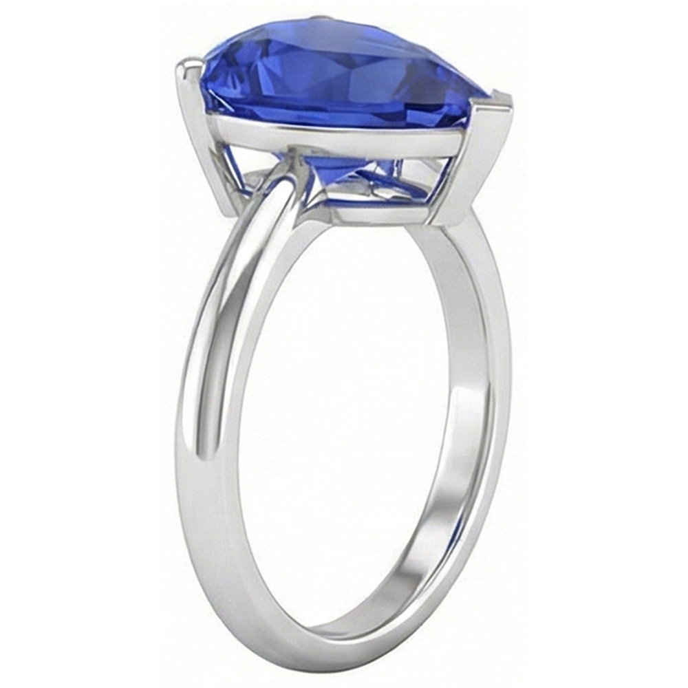 natural pear sapphire 3ct ring on white background