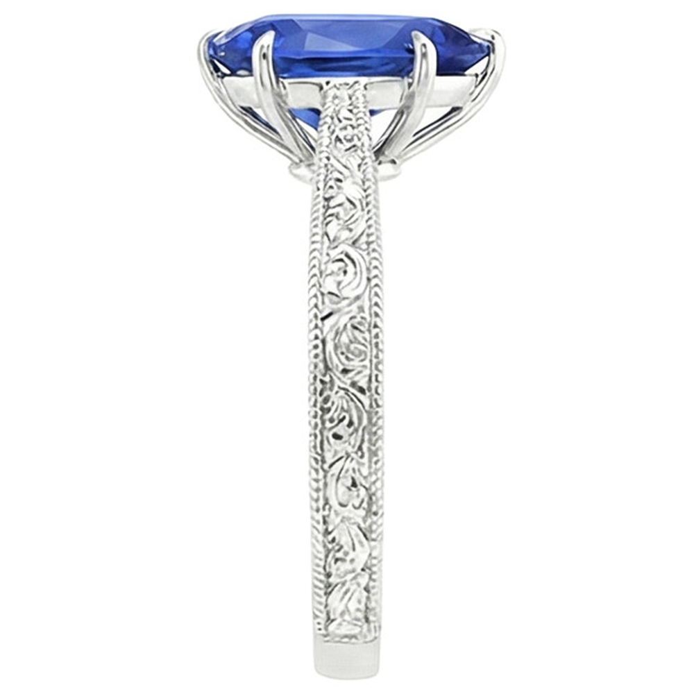 natural pear sapphire 2ct ring on white background