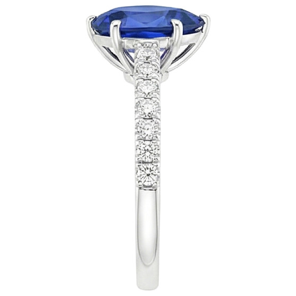 natural round sapphire 5.25ct ring on white background