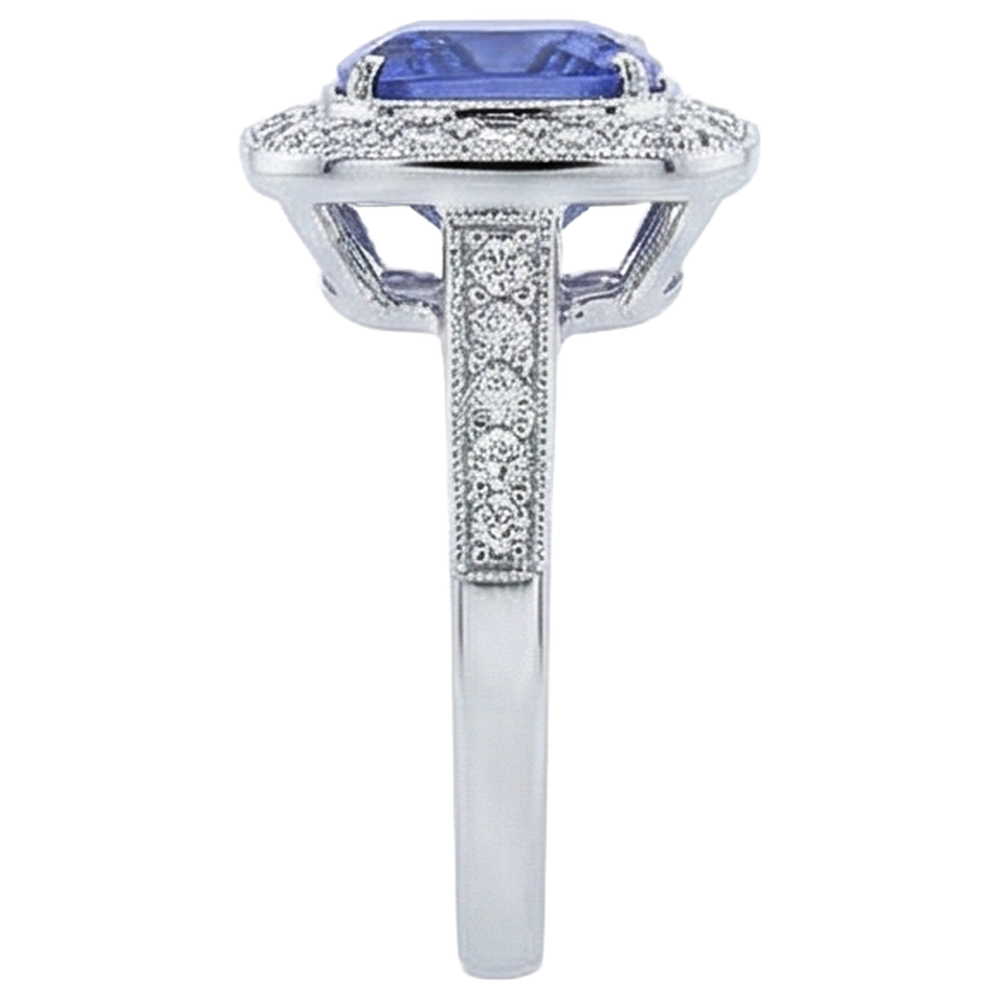 natural round tanzanite 18ct ring on white background