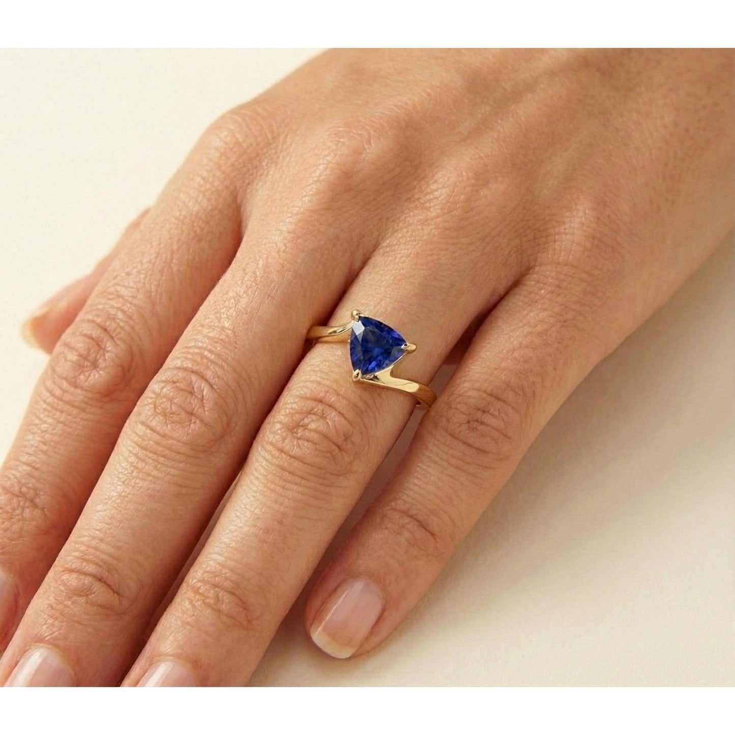 natural trillion sapphire 1ct ring on white background