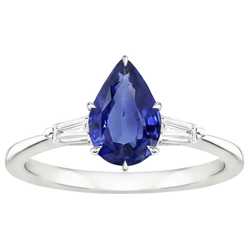 natural pear sapphire 3ct ring on white background
