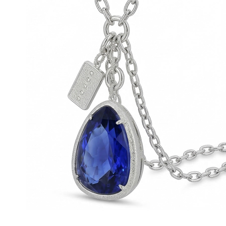 natural pear sapphire 4ct pendant side angle