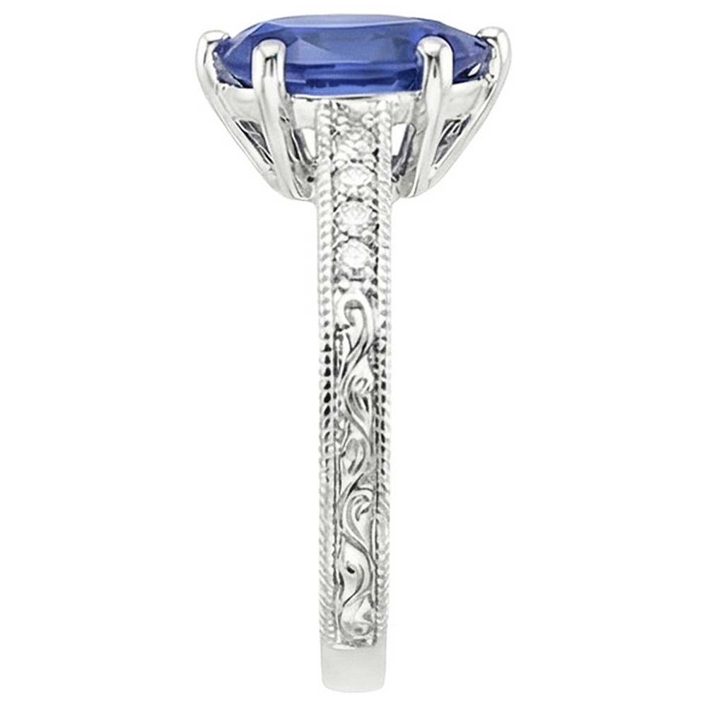 natural round sapphire 4.25ct ring on white background