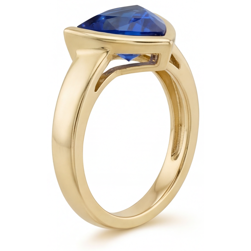 Trillion Cut Blue Sapphire ring in 14 Karat Yellow Gold – side view